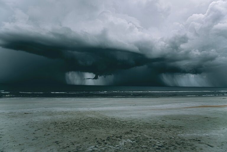 a beach under gloomy sky
