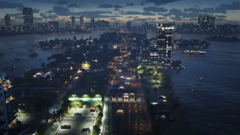 Vue aérienne de nuit d'une route éclairée traversant des îles et des gratte-ciel de Vice City, dans GTA 6